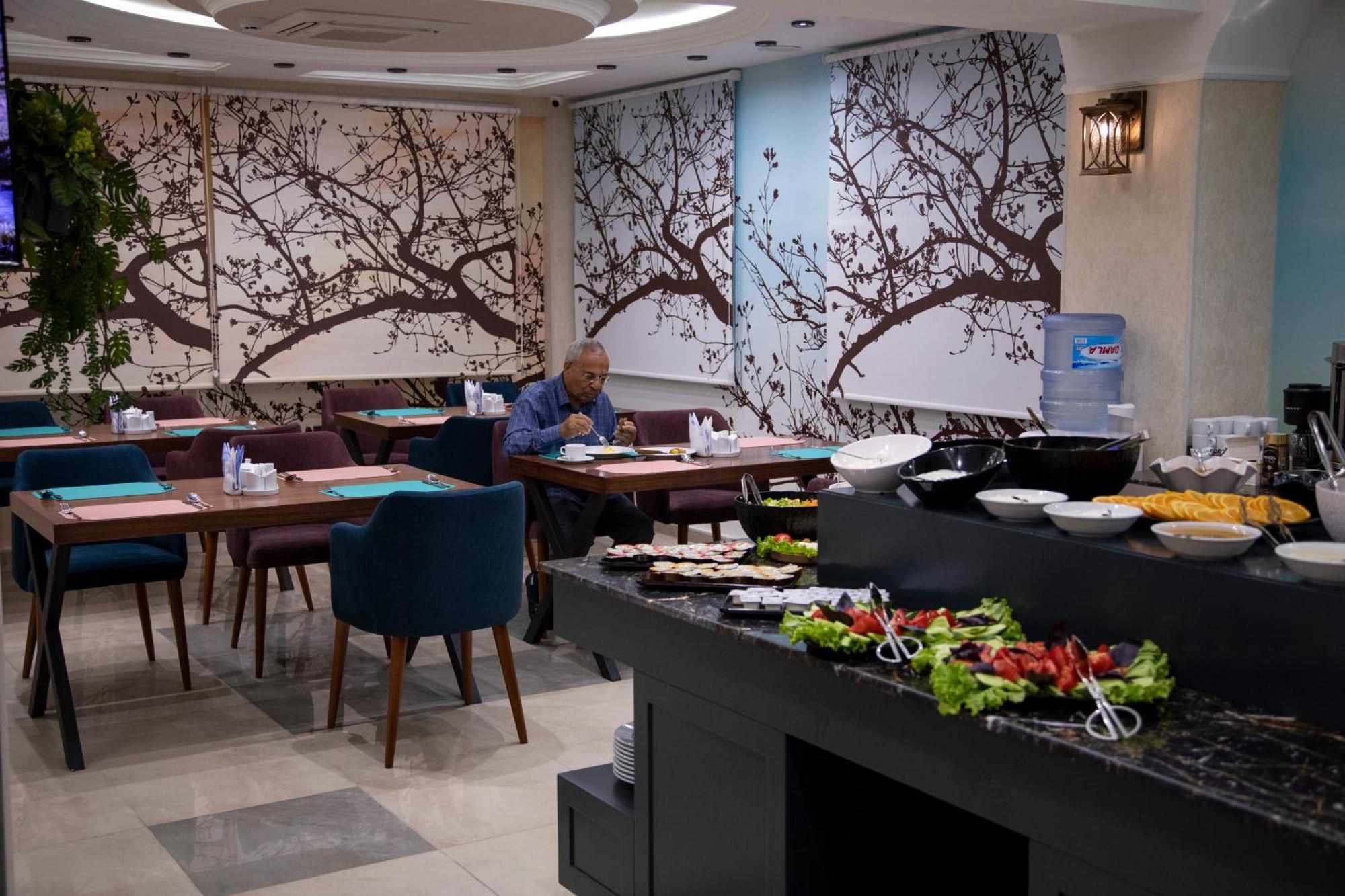 Essam Deluxe Hotel Баку Экстерьер фото