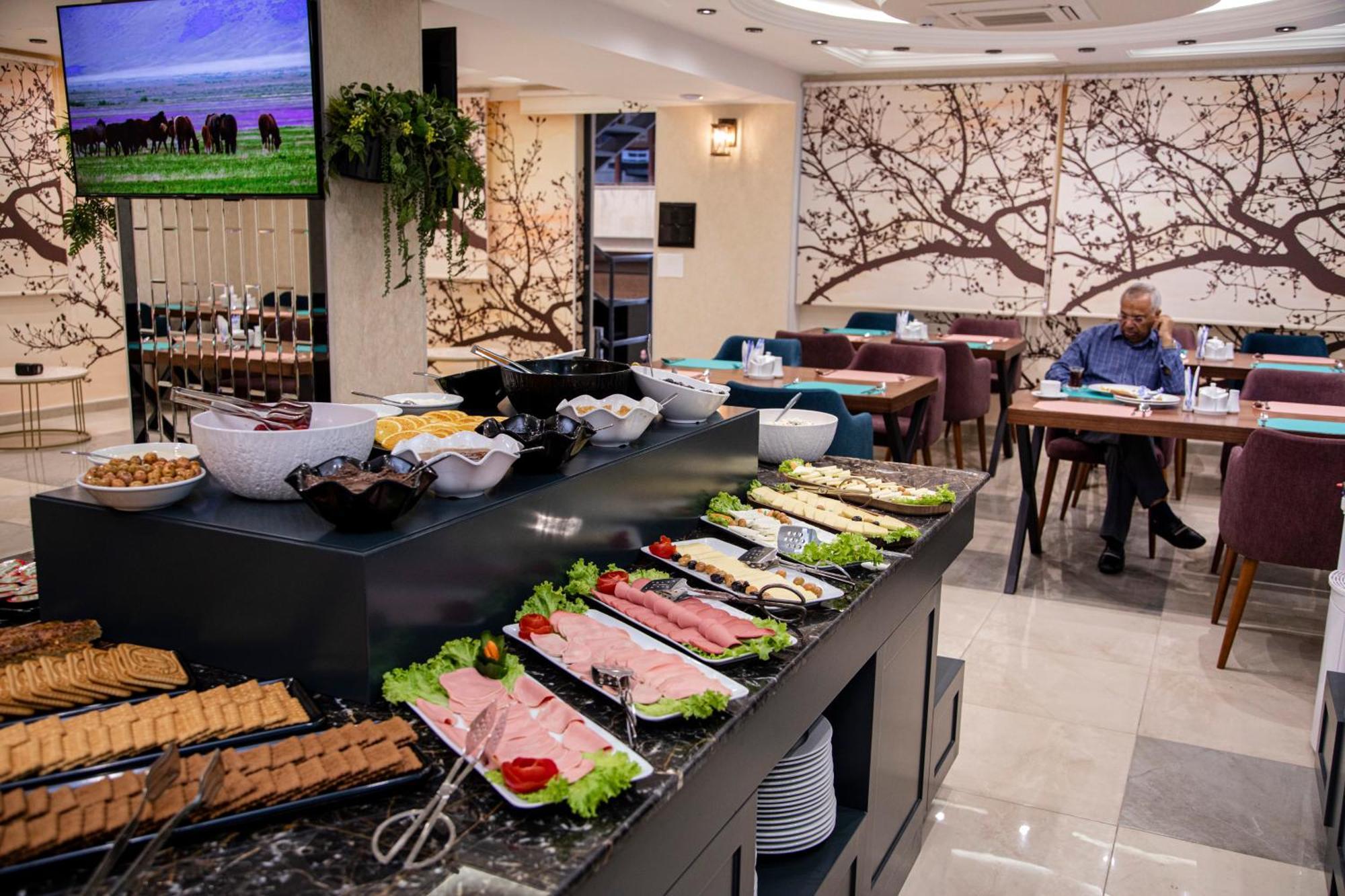 Essam Deluxe Hotel Баку Экстерьер фото